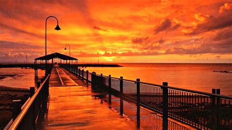 Download Queensland Sunrise Horizon Ocean Orange Color Australia Sunset Sky Man Made Pier Hd