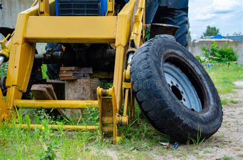 Old Rusty Tractor`s Flat Back Tire Industrial Stock Photo Image Of