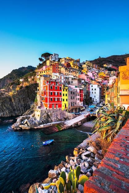 Premium Photo Riomaggiore Town Cape And Sea Landscape At Sunset