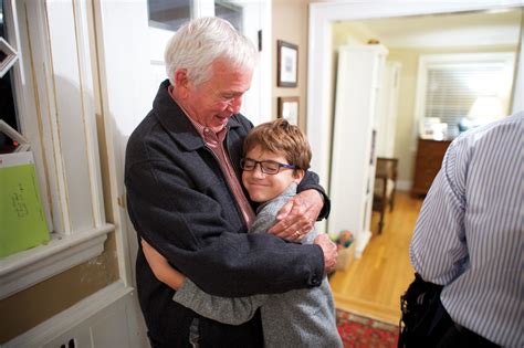 Grandfather Hugging Grandson