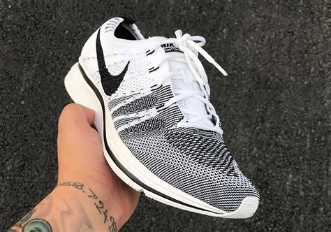 Nike Flyknit Trainer In White Black And Sunset Tint