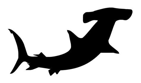 a black and white silhouette of a shark