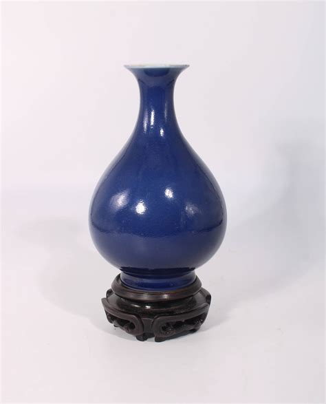 Chinese Blue Glazed Vase With A Wooden Base Xianfeng Mark Auction