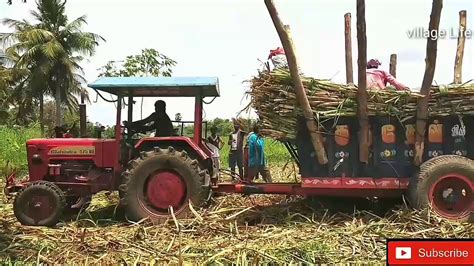 Mahindra Tractor Fully Loaded Sugarcane Trolley Pulling Tractor