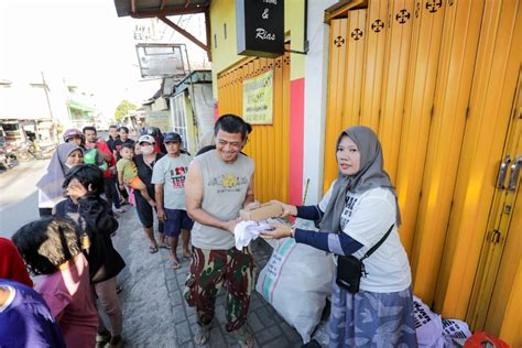 Aksi Sosial Kowarteg Ganjar Tuai Respons Positif Warga Surabaya Asumsi