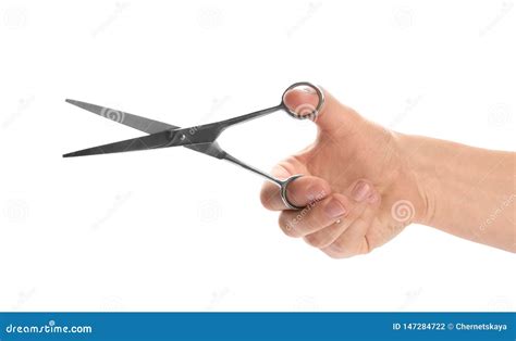 Man Holding Pair Of Barber Scissors Isolated On White Stock Photo