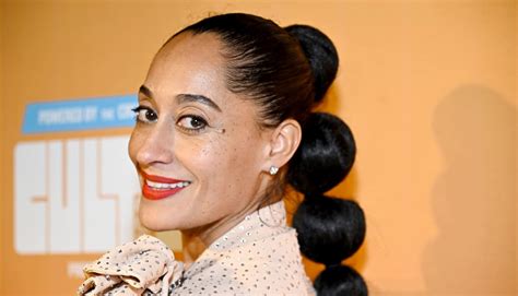 Tracee Ellis Ross Matched Her Boots To Her Ruby Woo Lipstick