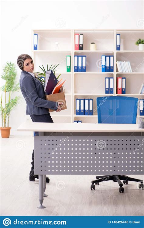 The Dismissal And Firing Concept With Woman Employee Stock Photo