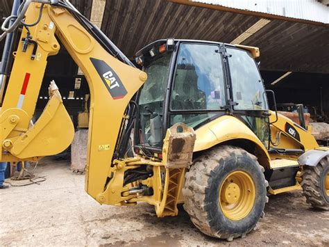 Retroexcavadora Caterpillar E Proveedor Per Precio De Venta