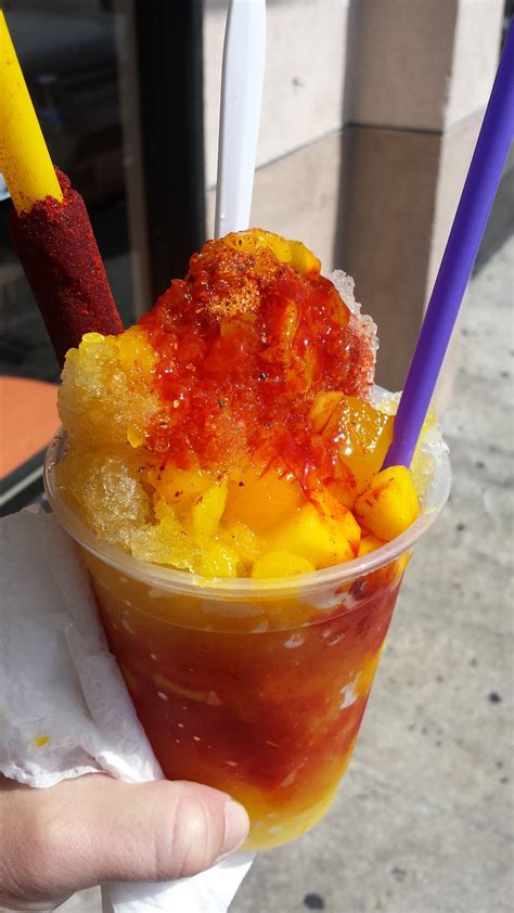 Mangonada Shaved Ice Mango In Syrup Tajin And Chamoy Sauce With A