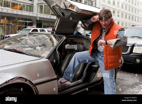 Back to the Future Marty McFly impersonator posing next to DeLorean ...