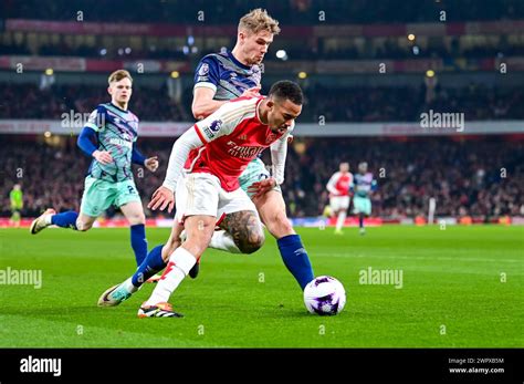 Kristoffer Ajer Of Brentford Fc And Gabriel Jesus Of Arsenal Fc