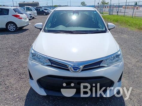 Toyota Axio HYBRID WHITE 2018 For Sale In Agrabad Bikroy