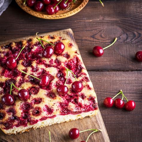 Premium Photo Baked Cherry Pie On A Brown Wooden Board