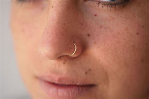 A Small And Delicate Hoop For Nose Ring Or Ear Piercing In 14k Yellow