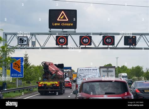 Smart motorway lane closure overhead gantry signs showing accident or ...