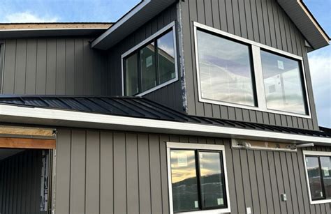 12″ Charcoal Board And Batten Panels And Black Standing Seam Roof Metalworks Canada