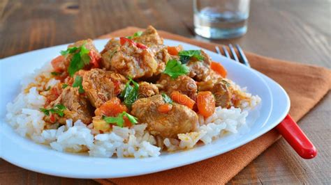 Guisado Delicioso Del Cerdo Con Arroz Imagen De Archivo Imagen De