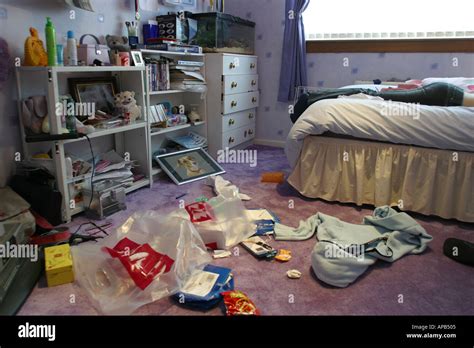 Teenage girl in messy bedroom Stock Photo: 1488132 - Alamy