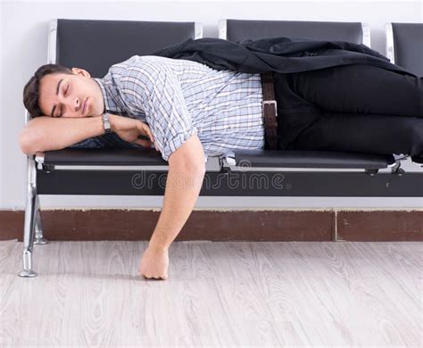 The Man Sleeping On The Chairs In Airport Stock Image Image Of