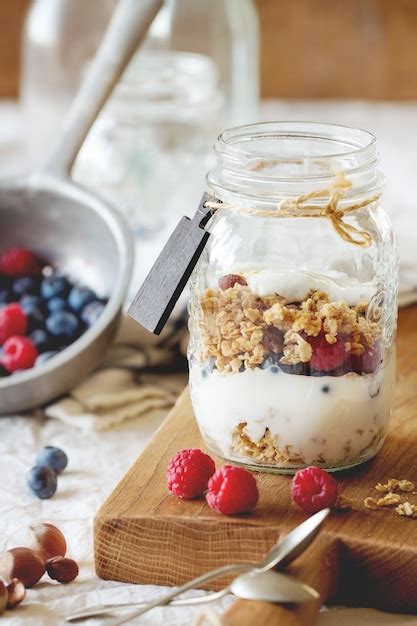 Premium Photo | Granola with yogurt berries