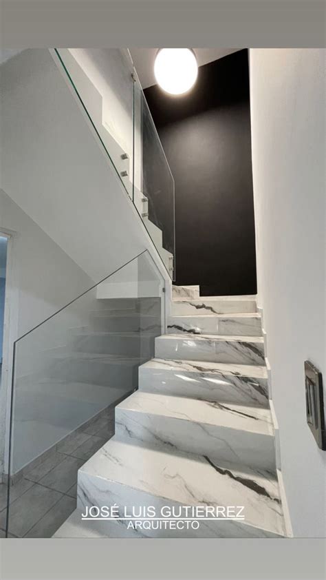 The Stairs Are Made Of Marble And Glass