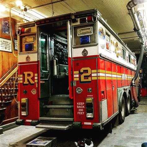 The Fire Truck Is Parked In The Garage