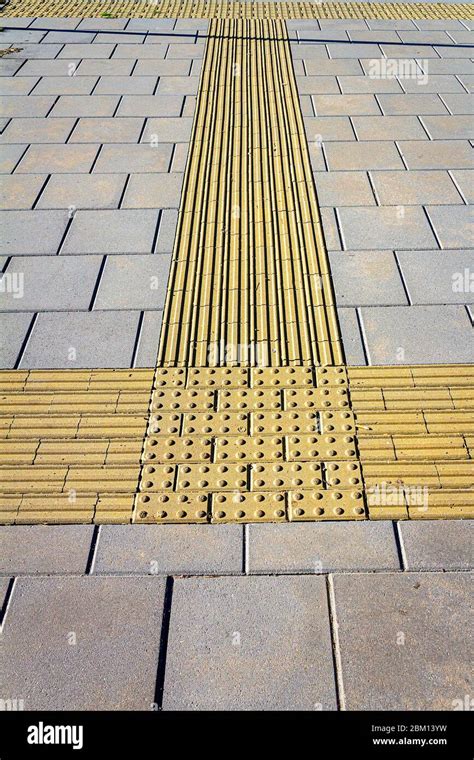 Textured Walkway For Blind People Yellow Tactile Paving For The