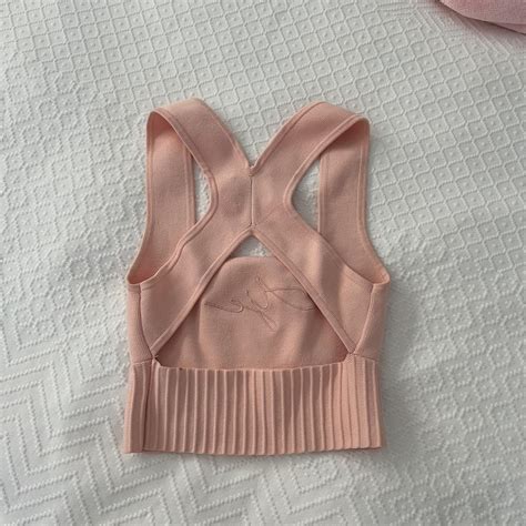 Livadi Cut Out Knit Logo Crop Top Nude Depop