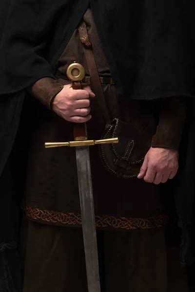 Cropped View Of Medieval Scottish Knight In Mantel With Sword — Costume