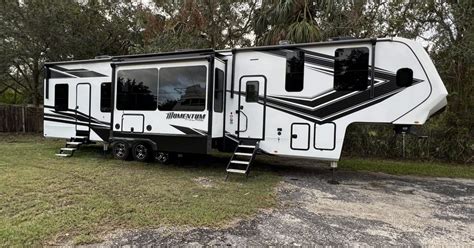 2022 Grand Design Momentum Toy Hauler Fifth Wheel Rental In Palmetto