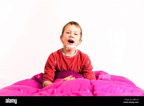 Boy Bed Yawn Hi Res Stock Photography And Images Alamy