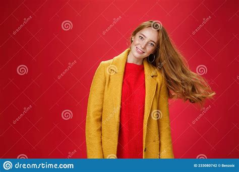 Charming Redhead Female With Freckles Waving Hair Smiling Broadly