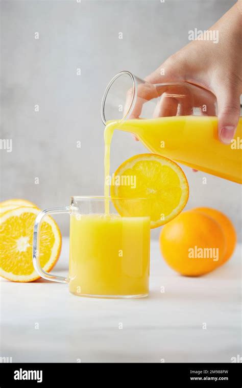 Pouring Orange Juice Bottle Pouring Hi Res Stock Photography And Images