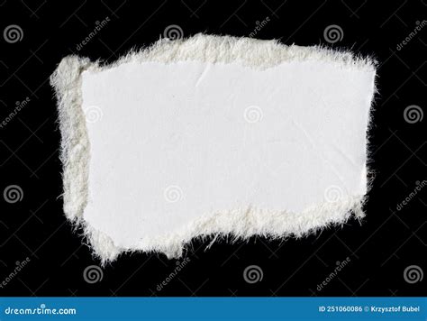 A White Piece Of Paper On A Black Isolated Background Stock Photo