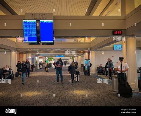 Travelers In The Terminal At General Mitchell International Airport In