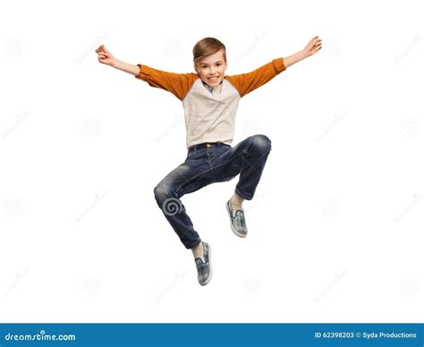 Happy Smiling Boy Jumping In Air Stock Photo Image 62398203