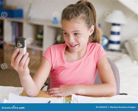 Young Girl Distracted From Her Homework Stock Photo Image Of Child