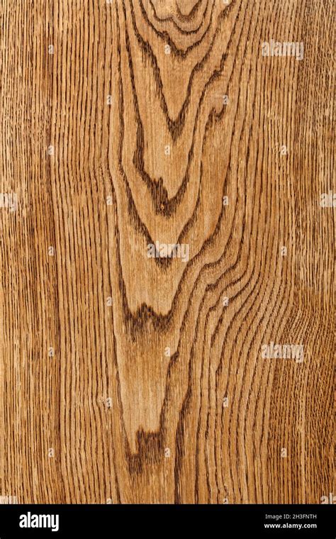 An Expressive Pattern Of Wavy Light Oak Wood Grain In The Form Of A