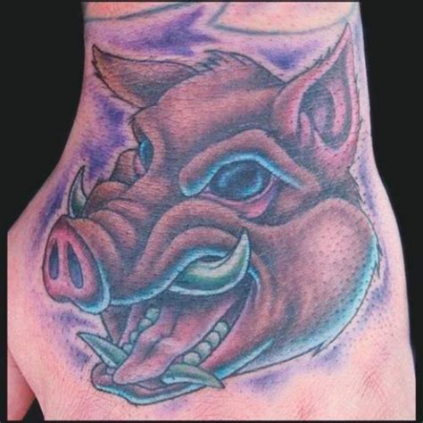 Razorback tattoo | Hand tattoos, Knuckle tattoos, Tattoos