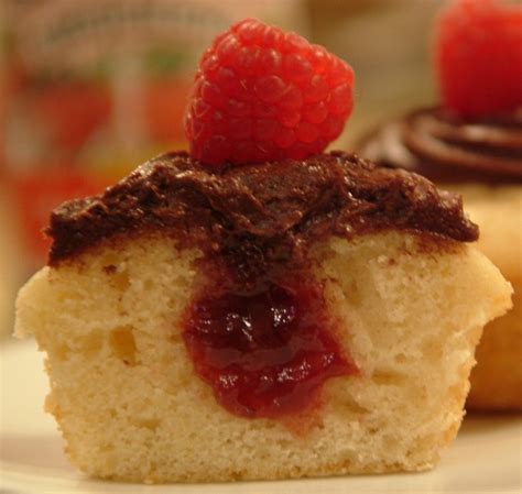 Raspberry Jam Filled Cupcakes With Chocolate Frosting From