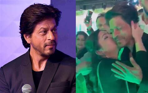 Watch Video Woman Grabs Shah Rukh Khan And Kisses Him At Dubai Event