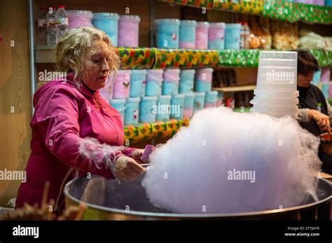 Whisked Sugar Dreams Into Reality A Skilled Woman Spins Magic At A