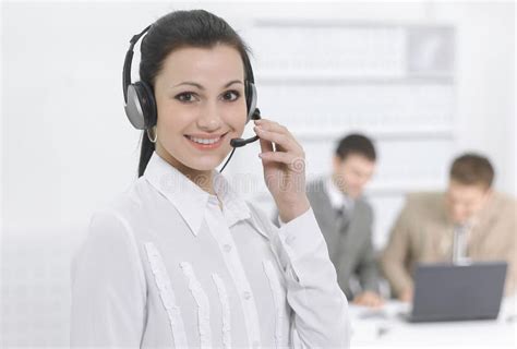 Portrait of an Employee Call Center in the Background of the Office ...