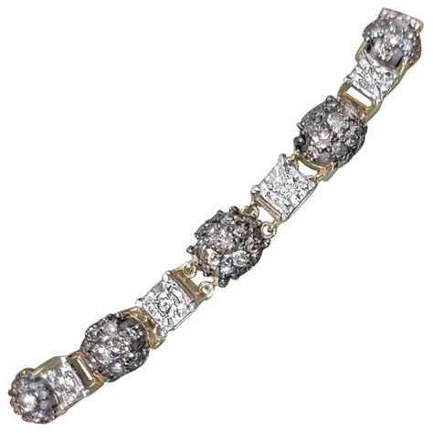 14 Karat Yellow Gold Diamond Link Bracelet With White And Conac Brown