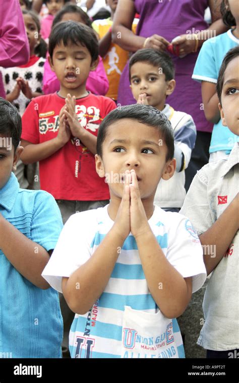 A Young Boy Praying Stock Photo Alamy
