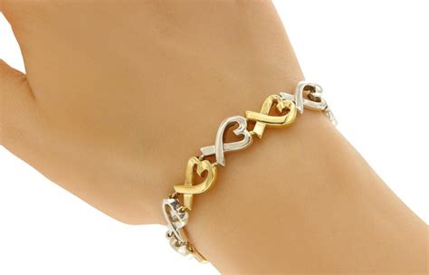 Tiffany And Co 18 Karat Gold And 925 Silver Paloma Picasso Hearts X Bracelet At 1stdibs Heart