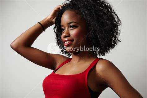 Black Woman In Red Dress With Bright Red Lips And Curly Hair Royalty