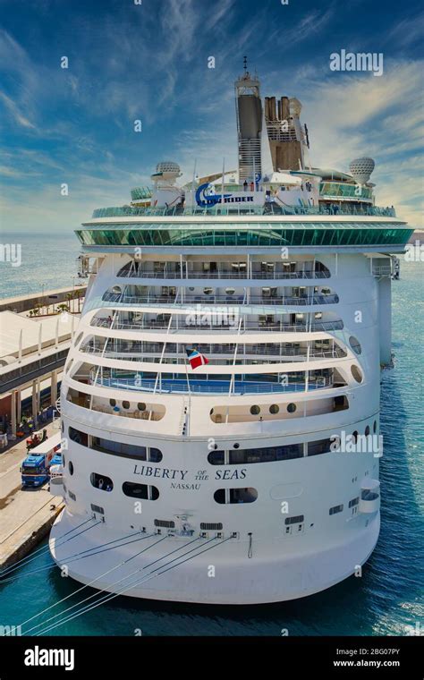 The Liberty Of The Seas Cruise Ship In Port Under Clear Blue Skies