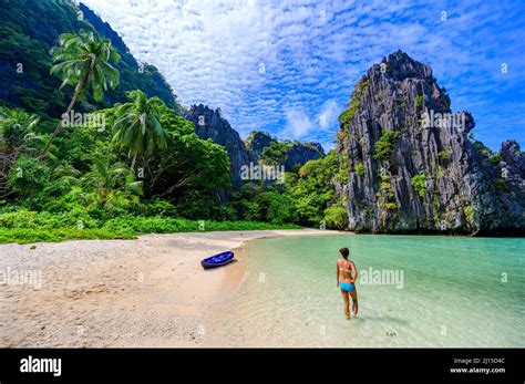 Girl At Hidden Beach In Matinloc Island El Nido Palawan Philippines Paradise Lagoon And